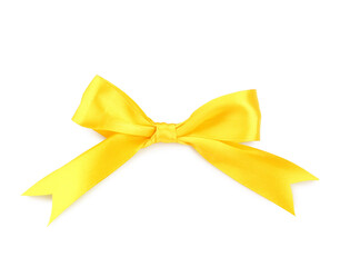 Bow made of yellow ribbon on white background