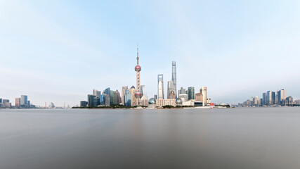 Cityscape of Shanghai at daytime. Panoramic view of Pudong's skyline from the Bund. Located in Waitan. One of the most famous tourist destinations in Shanghai.