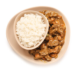 Plate with tasty beef curry and rice on white background