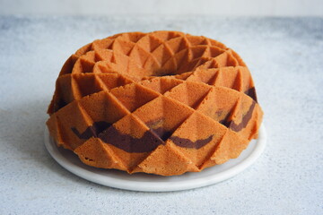 a whole of marble cake in white background  