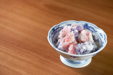 small season cake made of flour boiled in coconut milk sprinkled with shredded coconut 