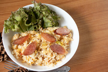 Fried rice with chinese sausage(Kun Chiang fried rice) in a white plate