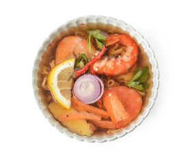 Bowl of spicy Thai soup on white background
