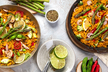 Vegan Paella on gray background.