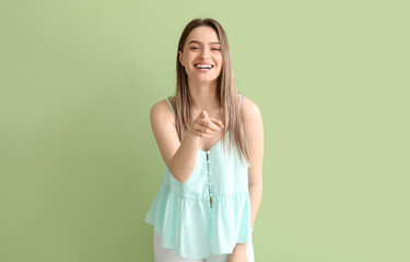 Young gossiping woman on color background