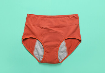 Reusable period panties on color background