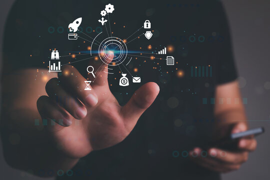 Man hand touching virtual screen to AR virtual screen dashboard with project management with icons of scheduling, budgeting, communication.