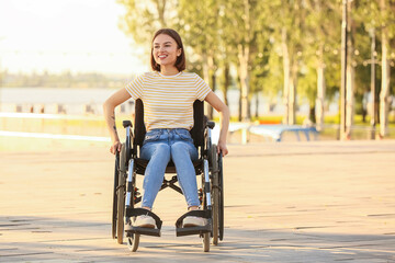 Young woman with physical disability outdoors