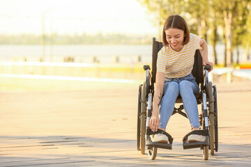 Young woman with physical disability outdoors