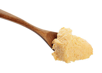 Spoon with delicious hummus on white background