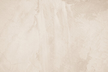 Cream concreted wall for interiors or outdoor exposed surface polished concrete. Cement have sand and stone of tone vintage