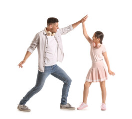 Obraz premium Dancing man and his little daughter on white background