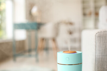 Naklejka premium Modern humidifier in living room, closeup