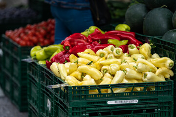 Red, yellow and green pepper on the open market.