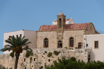 Fototapeta premium Chrysoskalitissa Monastery, a 17th-century Eastern Orthodox Christian monastery built up on rocks 35 metres above the water facing the Libyan Sea, Southern Crete, Greece