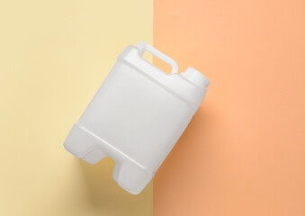 Plastic jerrycan on color background