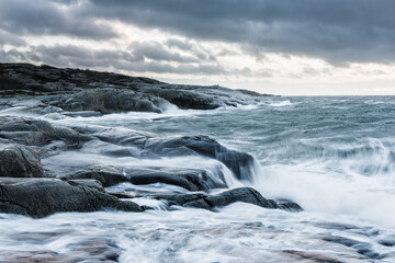 Waves crashing on rocks