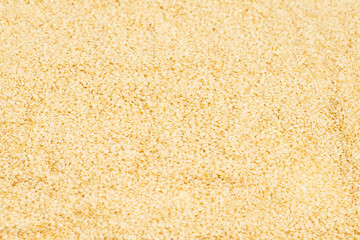 Sesame seeds as a background.