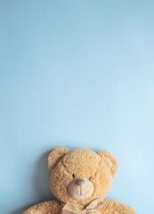 Teddy bear on the blue background