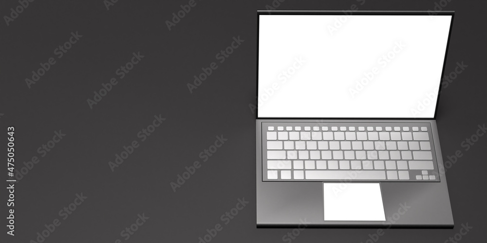 Aufkleber an open laptop next to a place for text. laptop on a gray background. work, communication and entert