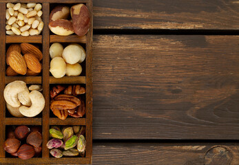 assortments of nuts on wooden surface