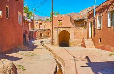 Walk the old street of Abyaneh and explore the arched exterior of preserved medieval qanat - the...