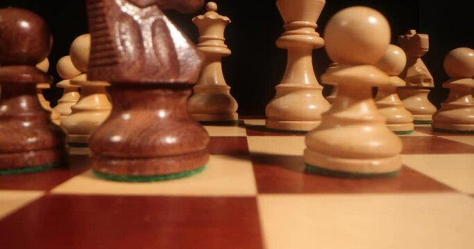 Chess board and pieces close up . Chess figures on chess board macro shot . Slider move, 4k