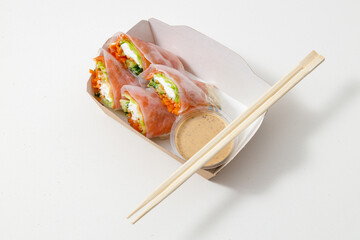 Vegan and tasty in paper package with chopsticks