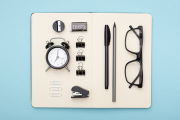 Set of office items lie on the table. Minimalistic set for work and study