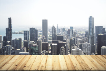 Fototapeta na wymiar Wooden tabletop with beautiful Chicago buildings on background, mock up