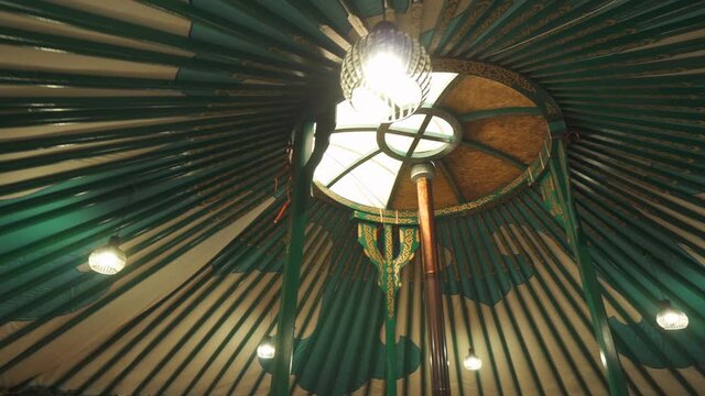 Gimbal round motion mystical Buryat yurt painted patterns ceiling, historical architecture Baikal region Siberia. Authentic culture construction of dwellings. Shaman's house. Turkic Mongol nomads. 4k