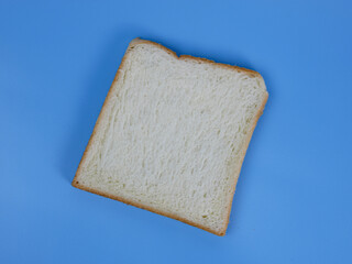 toast bread on pastel blue background