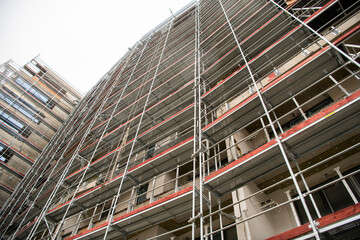 Construction of a building using scaffolding