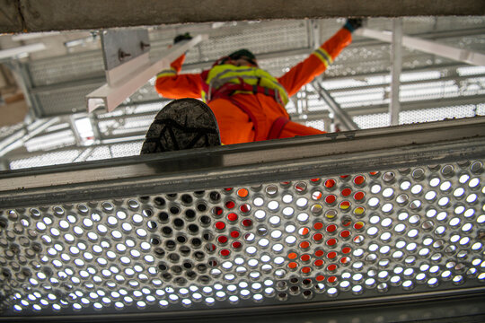Construction of a building using scaffolding
