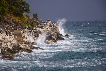 Waves crashing on rocks. Greece