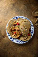 Homemade buckwheat pancakes with cranberry and walnut