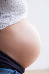 Pregnant woman's belly close-up
