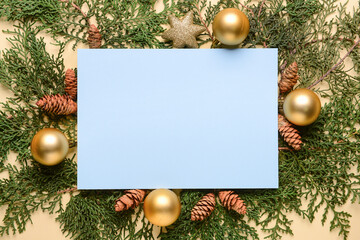 Blank card and Christmas decor on yellow background