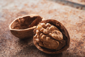 single walnut  on a rustic background .