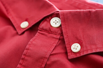 Buttons on shirt collar, closeup