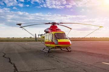 Foto op Plexiglas Modern medical helicopter at the helipad © Dushlik