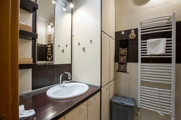 Bathroom interior with towel dryer