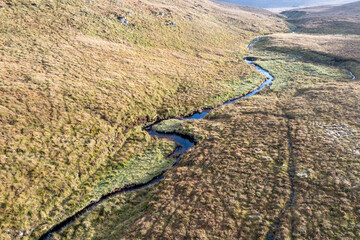 Beatiful stream flowing from the Mountains surrounding Glenveagh National Park - County Donegal, Ireland.