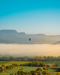 Balloon ride at sunrise over the clouds in the Canyons region of Praia Grande Santa Catarina Brazil