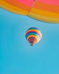 Obraz premium Balloon ride at sunrise over the clouds in the Canyons region of Praia Grande Santa Catarina Brazil