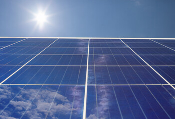 Power solar panel on blue sky background,alternative clean green energy concept. Web banner.