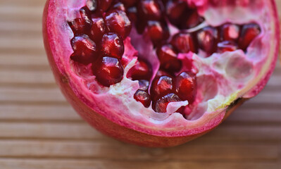 Ripe half pomegranate close up