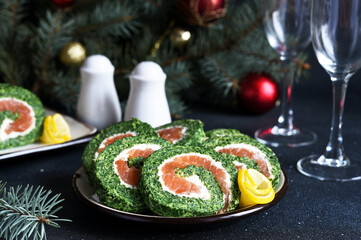 Roll with spinach on the New Year's table.
Cheese and salmon appetizer.