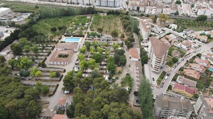 Nice aerial image of camping and part of the city