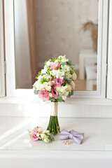 Groom's morning. Wedding accessories: rings, boutonniere, wedding bouquet, cufflinks. vertical template stories